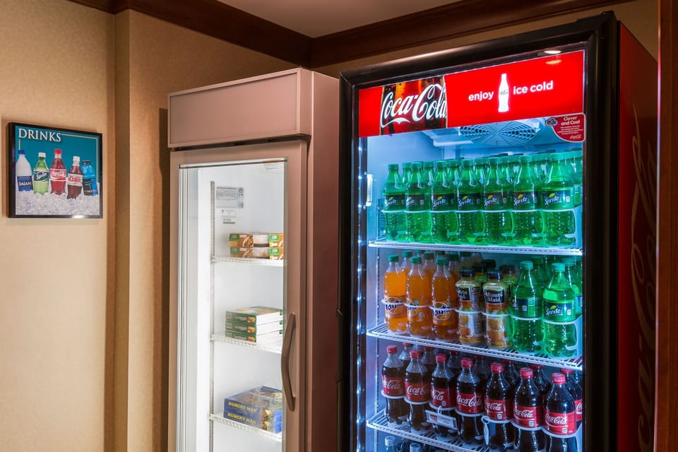 Convenience shop with cold beverages and daily essentials on-site.