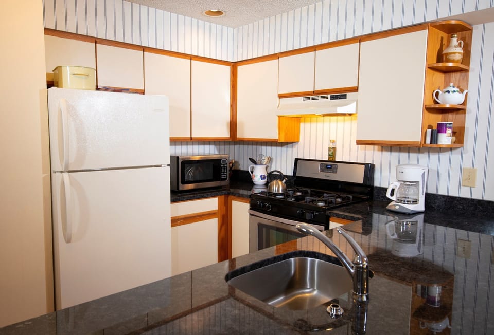 Prepare a meal in the equipped kitchen.