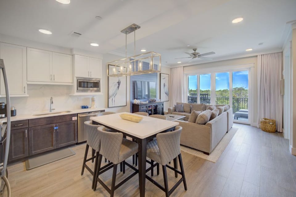 A stylish kitchen island offering the perfect spot for brunch or cocktails with friends.