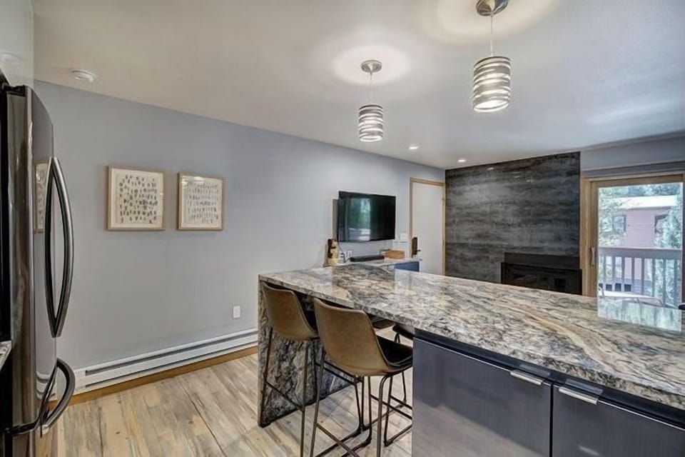 Featuring modern appliances and comfy counter seating. 
