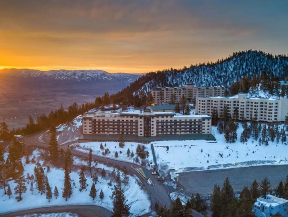 Witness breathtaking sunsets over snowy peaks and valleys, offering a magical alpine escape.