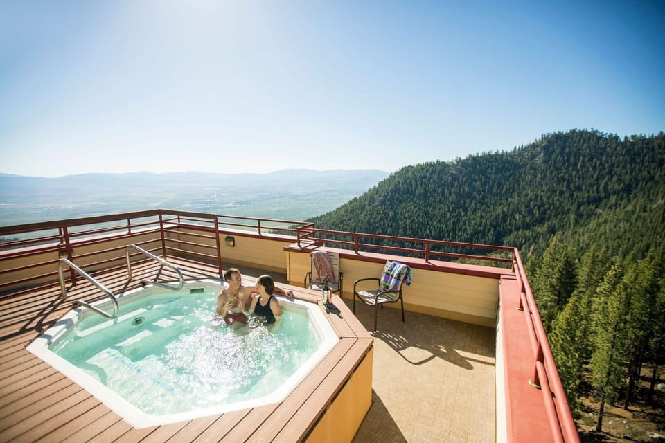 Soak in the Shared Hot Tub overlooking the area.