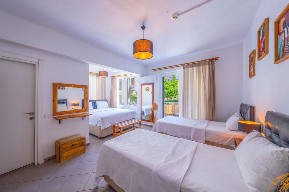 Family Quadruple Room, City View | Premium bedding, laptop workspace, iron/ironing board, free WiFi
