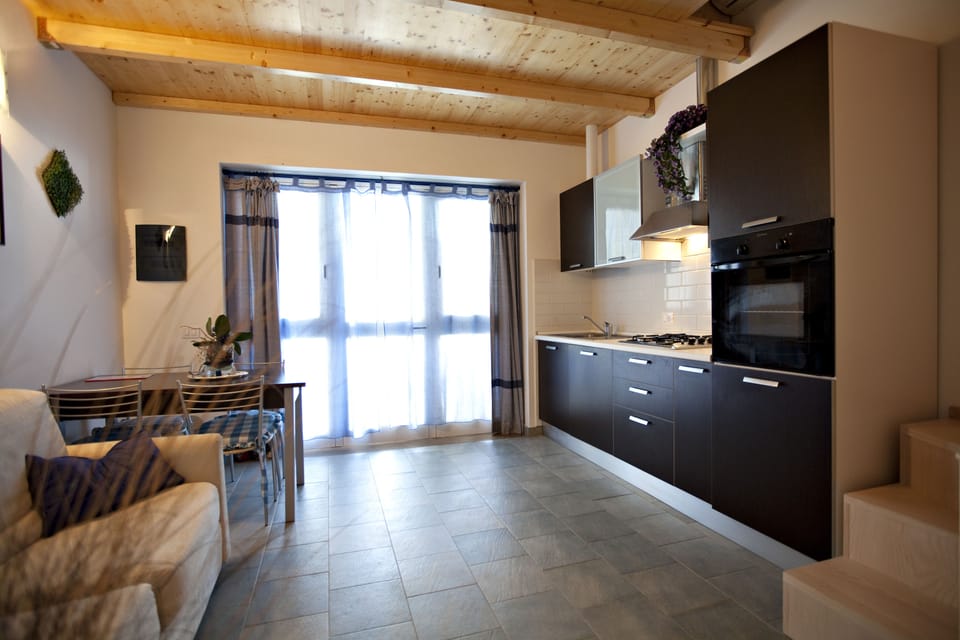 Comfort Apartment, 2 Bedrooms, Kitchen, Beach View | Private kitchen | Full-size fridge, stovetop, coffee/tea maker, cookware/dishes/utensils