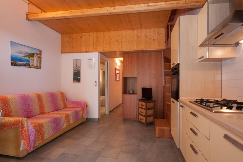 Comfort Apartment, 2 Bedrooms, Kitchen, Beach View | Private kitchen | Full-size fridge, stovetop, coffee/tea maker, cookware/dishes/utensils