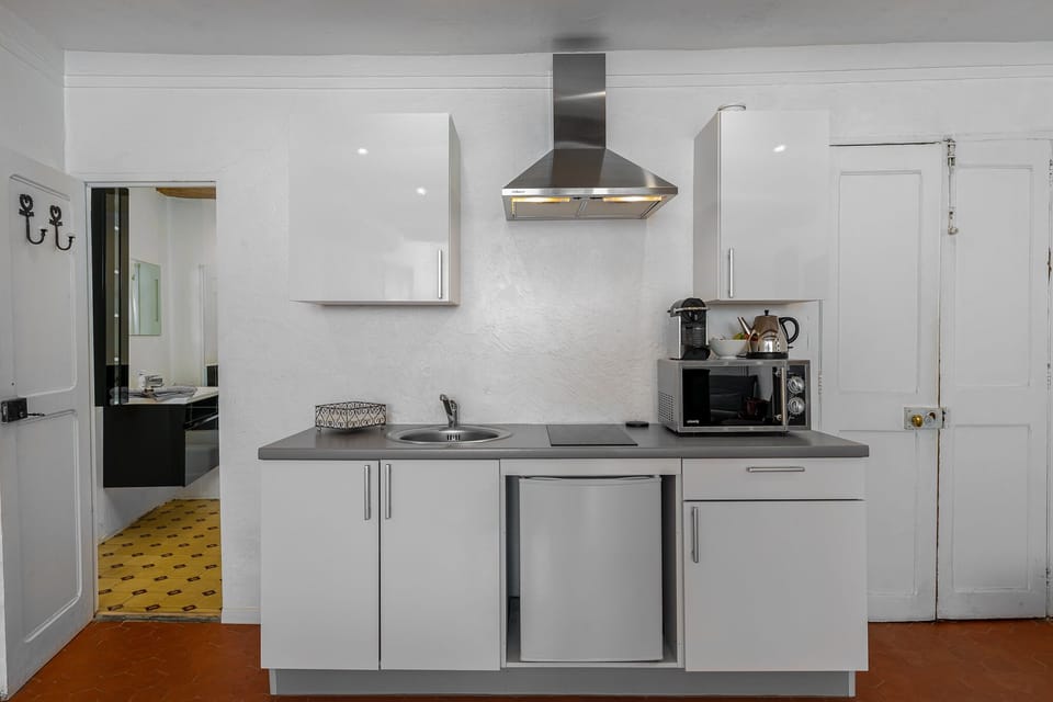 Premium Suite, City View | Private kitchenette | Fridge, microwave, espresso maker, electric kettle