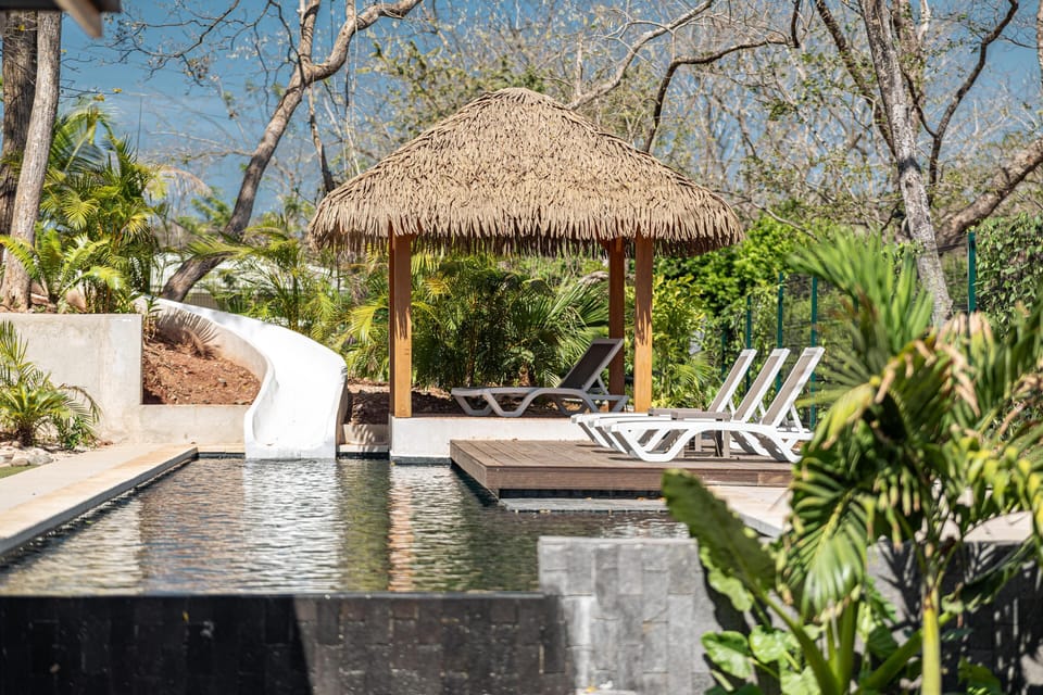 Pool with slide and outdoor rancho