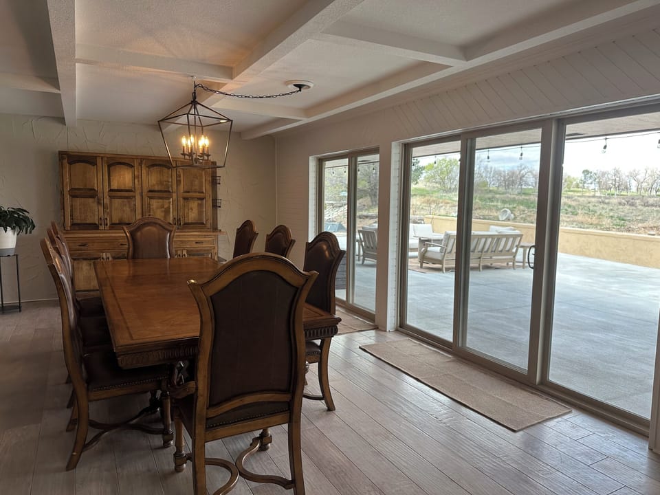Dining room with access to patio overlooking golf course 
