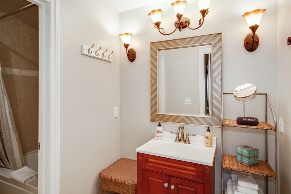 Full Shared Bath 1 with a Separate Tub/Shower Combo | Main Level