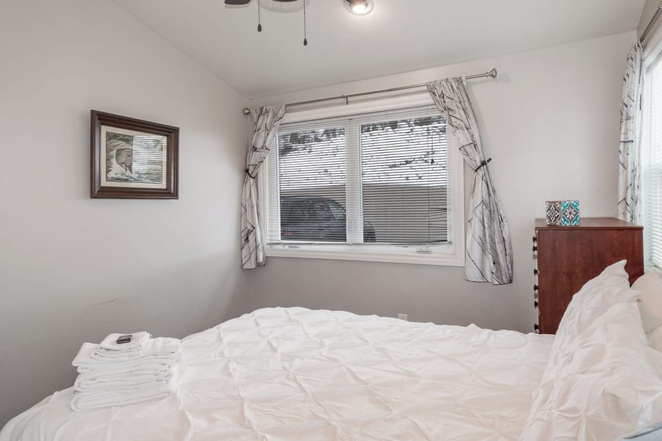 Main Level Bedroom 1 with a Queen Bed | Main Level