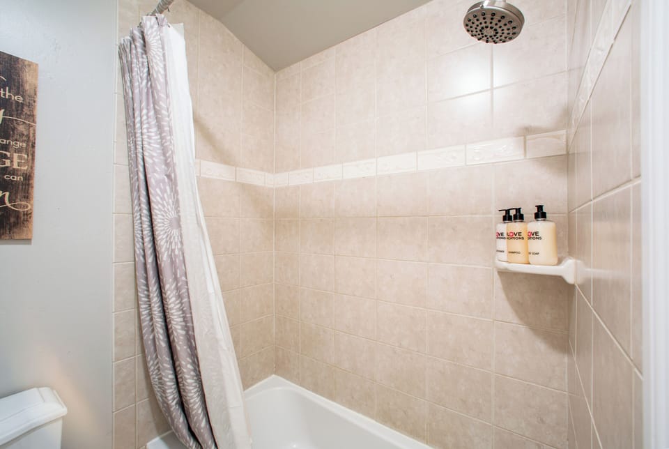 Full Shared Bath 1 with a Separate Tub/Shower Combo | Main Level