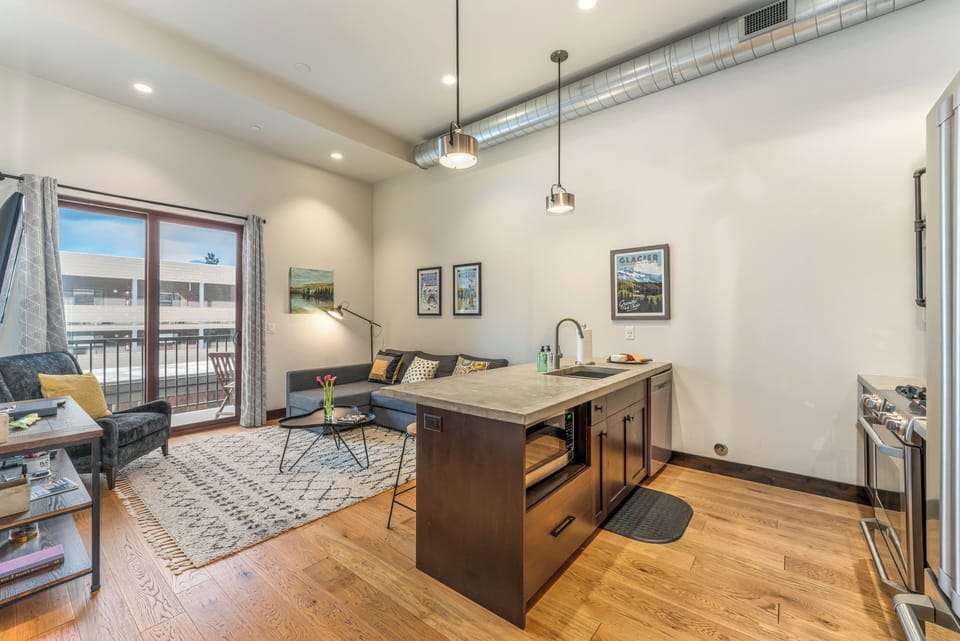 Kitchen island with bar seating for 4 | Main Level