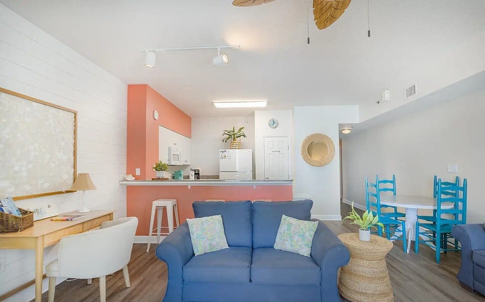 Living room with a sleeper sofa and smart TV