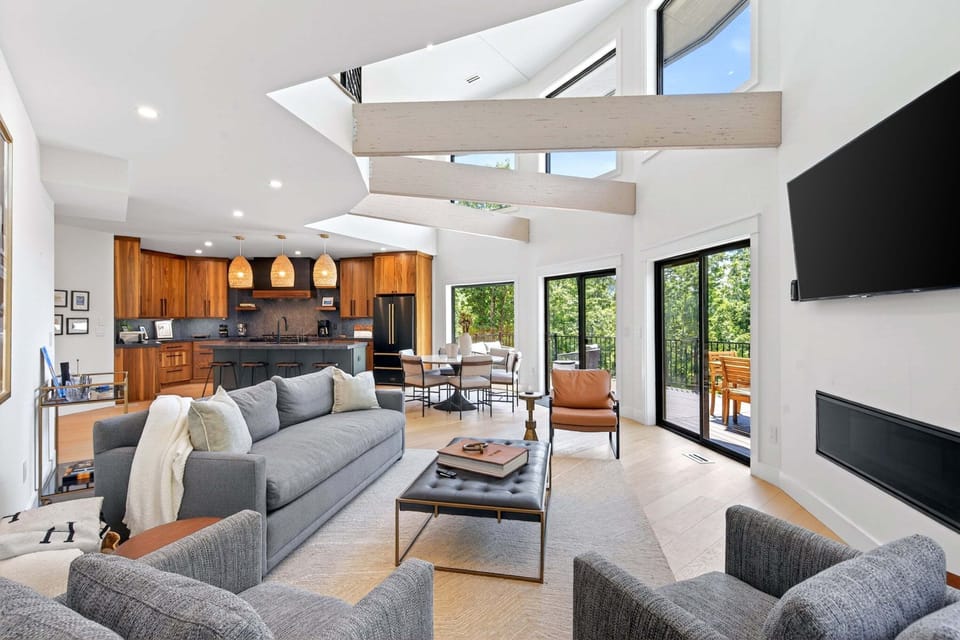 Gather around the gas fireplace in the living room to stream your favorites on the Smart TV.