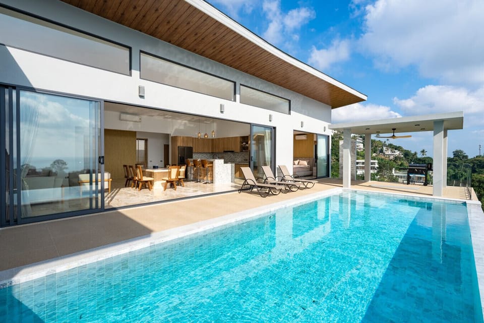 Soak up the sun beside your private infinity pool or unwind in the shaded outdoor lounge with sweeping views.