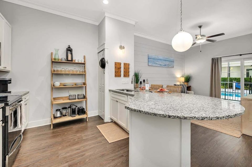 Breakfast bar open to living room.