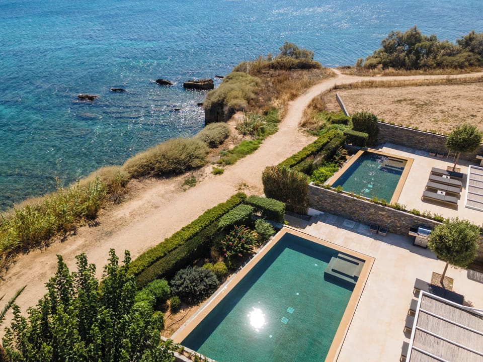 Beachfront Villa - 2 meters away from secluded sandy beaches