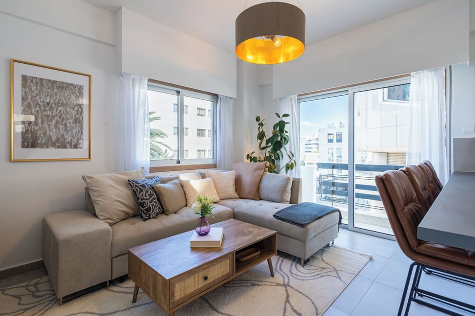 Deluxe Apartment, 1 Queen Bed with Sofa bed, Non Smoking, City View | Living room | Flat-screen TV