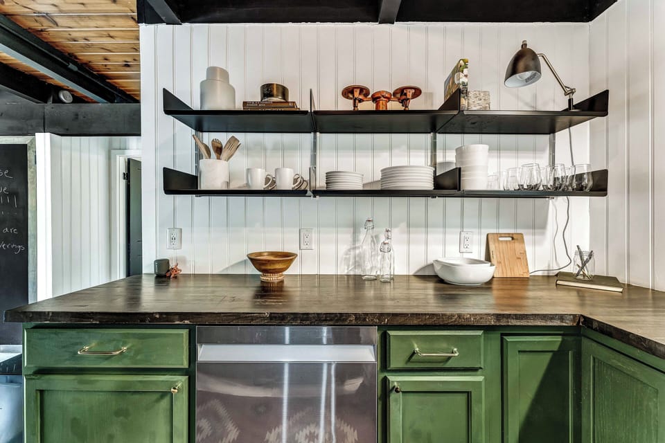 Enjoy the convenience of easily accessible dinnerware storage and spacious countertops, making meal prep and dining a breeze!