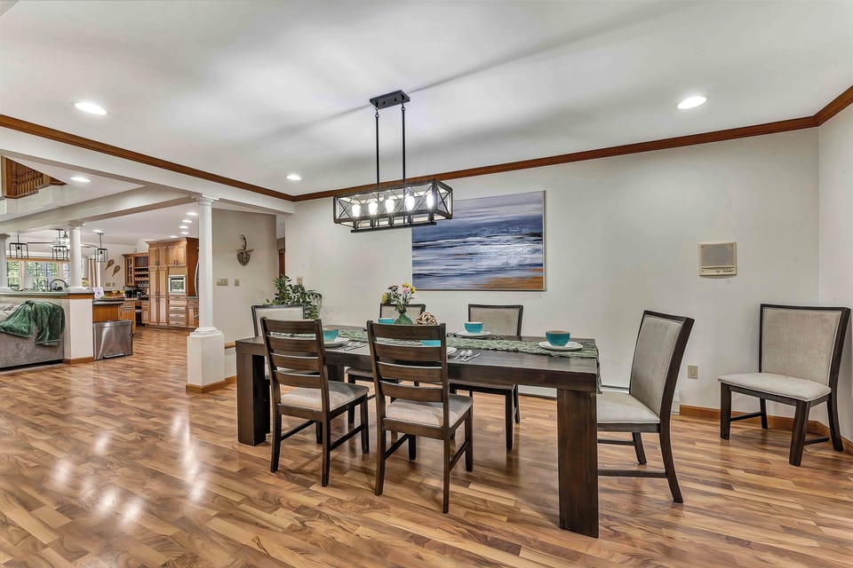 Gather your group around the heart of the home—our elegant dining hall, designed to seat 6 to 8 guests comfortably. Whether you're sharing a homemade breakfast, a holiday dinner, or late-night takeout, this space brings everyone together. With warm lighting, tasteful decor, and views into the living areas, it’s the perfect setting for meaningful conversations, laughter, and unforgettable meals.