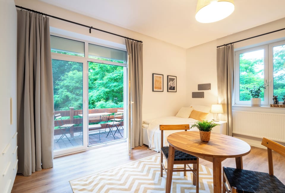 Apartment, 2 Bedrooms (287998) | Living area | 60-inch flat-screen TV with cable channels