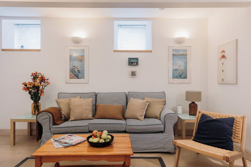 Curl up with a film or a book — the lounge includes a smart TV, WiFi, and plenty of natural light.