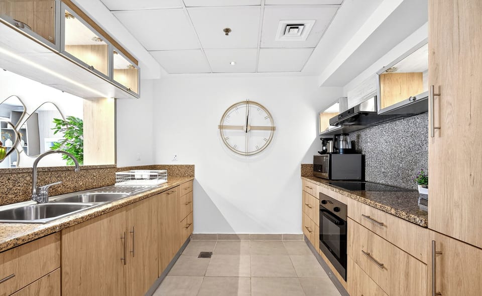 Standard Apartment, Beach View | Private kitchen | Full-size fridge, microwave, oven, stovetop