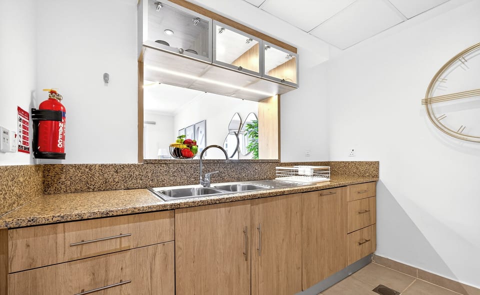 Standard Apartment, Beach View | Private kitchen | Full-size fridge, microwave, oven, stovetop