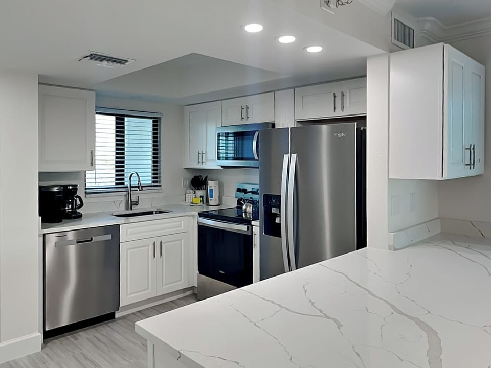 Fully Equipped Kitchen with Stainless Steel Appliances