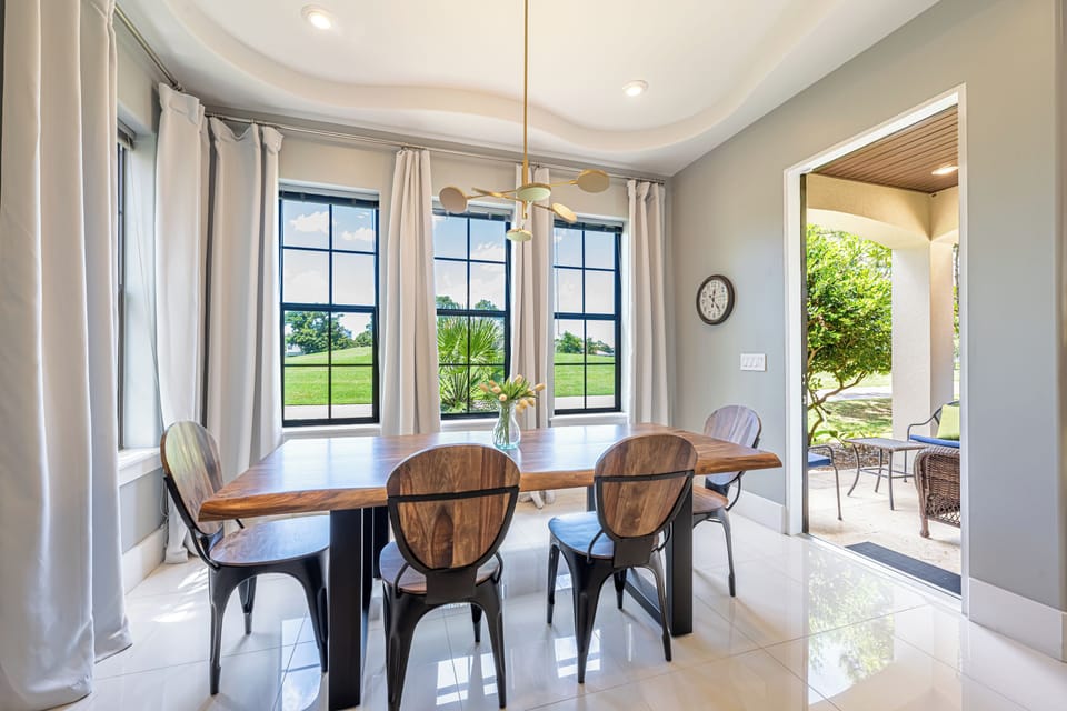 Dining Area Leading to Back Patio