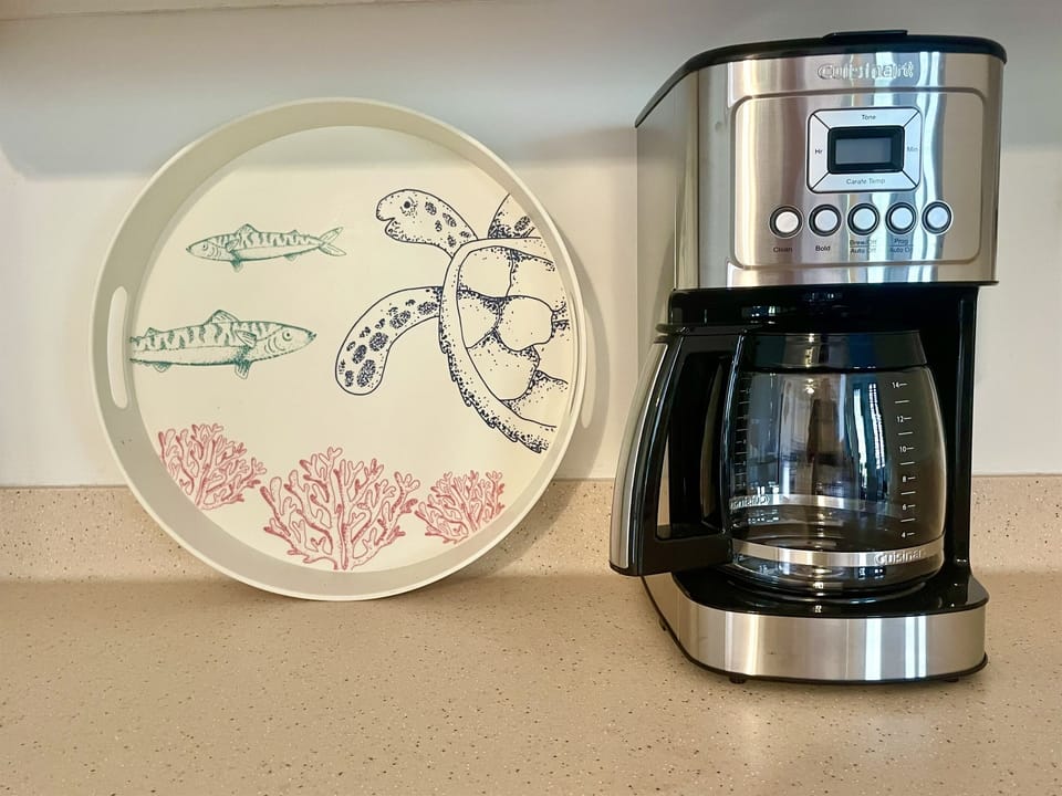 Start your day with a cup of coffee from the machine or using a cafetière. A kettle and microwave are also provided for your convenience