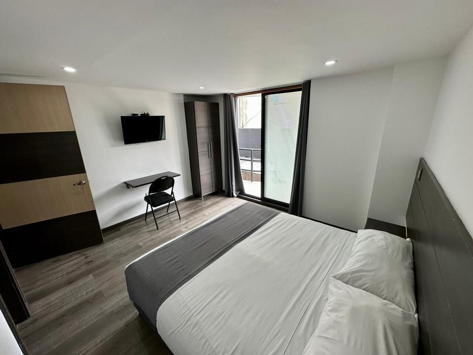 Desk, blackout drapes, iron/ironing board, free WiFi