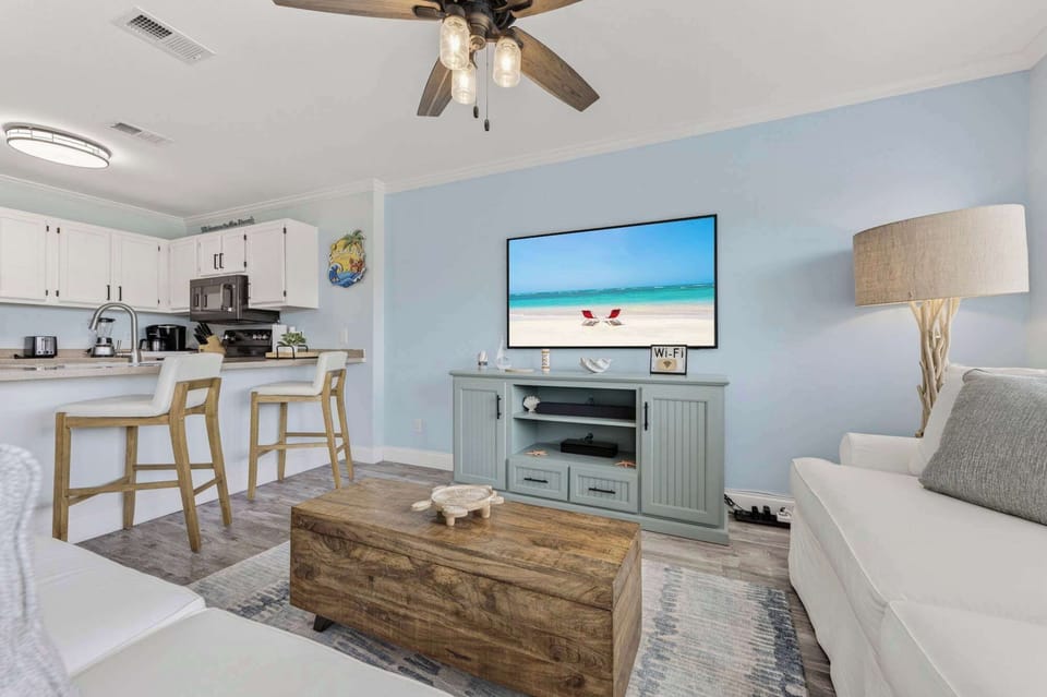Curl up in the coastal living room & stream your favorites on the smart TV