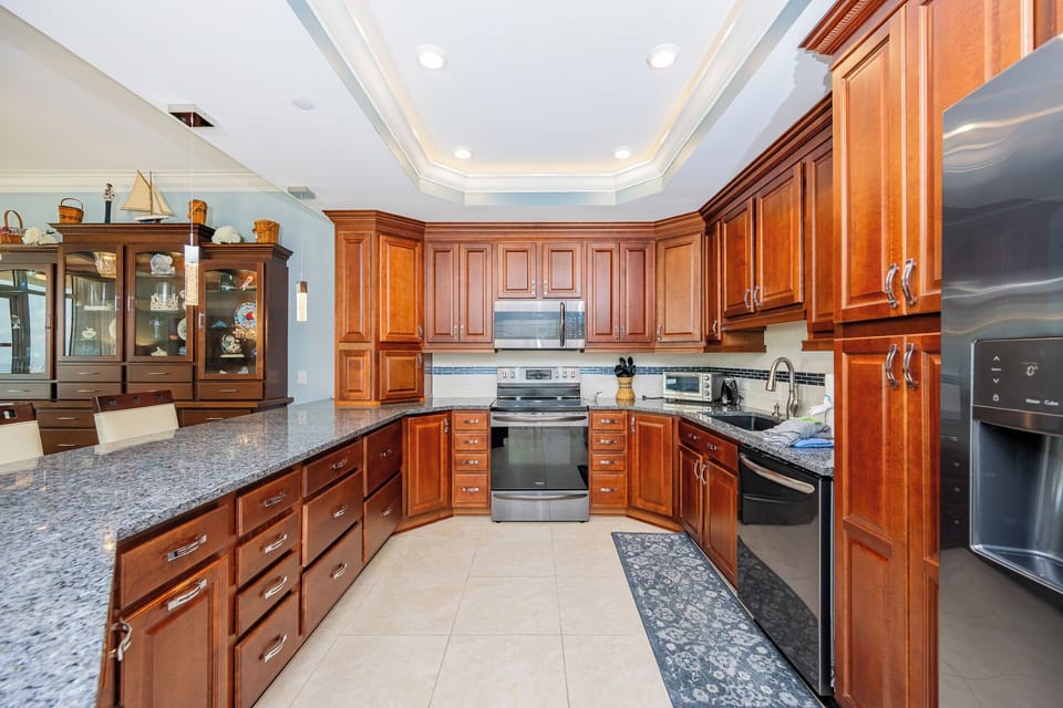 Feel inspired as you create culinary masterpieces in this elegant kitchen, where every detail welcomes your creativity