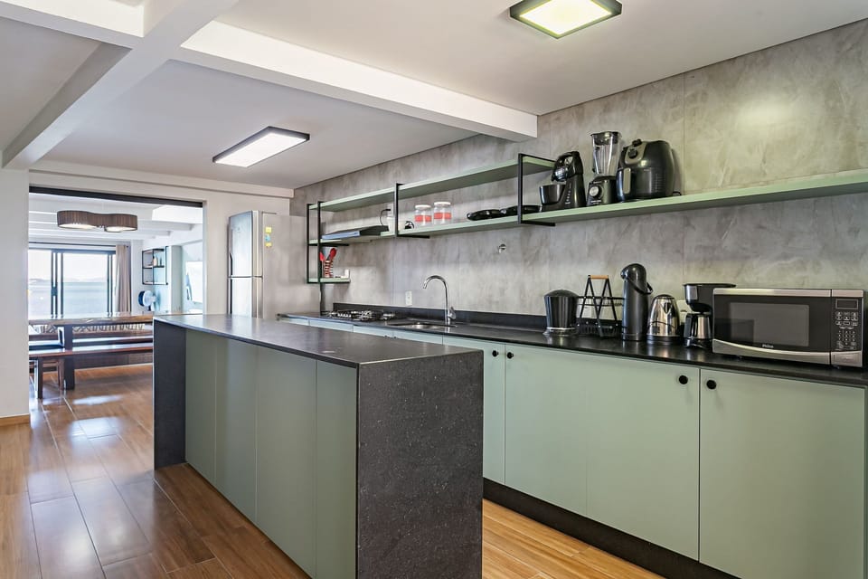 Honeymoon House, Jetted Tub, Beach View | Private kitchen | Dining table