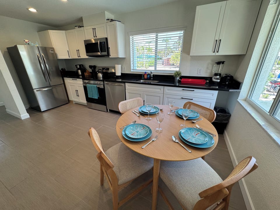 Full kitchen and dining table.  All updated appliances, newly renovated 2024.