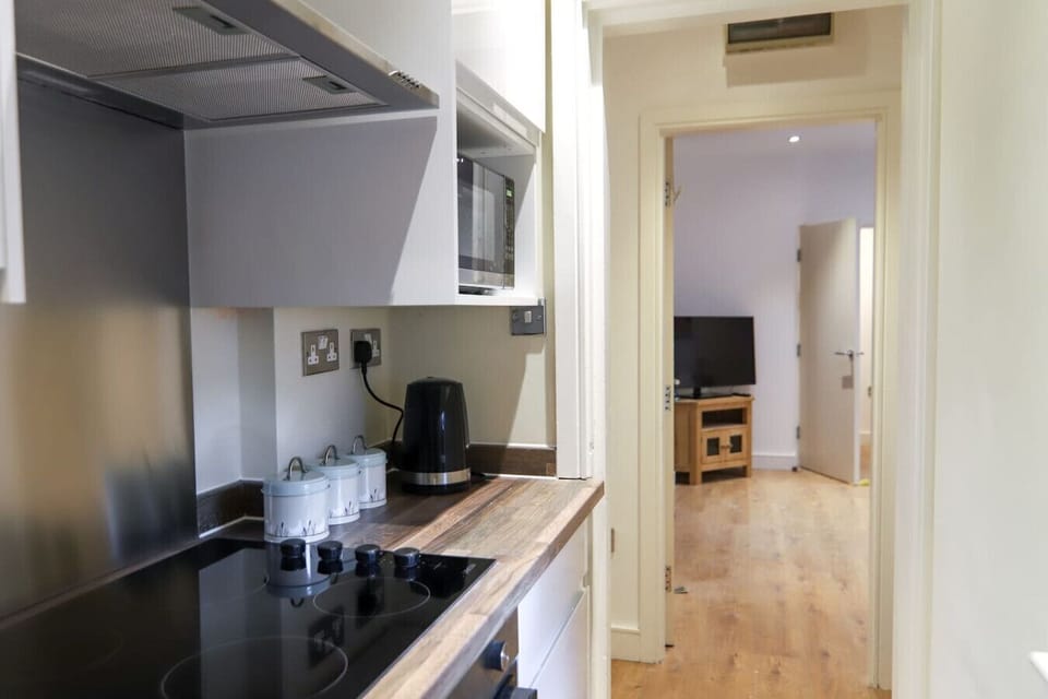 A well-equipped kitchen stocked with all the essentials for cooking at home.
