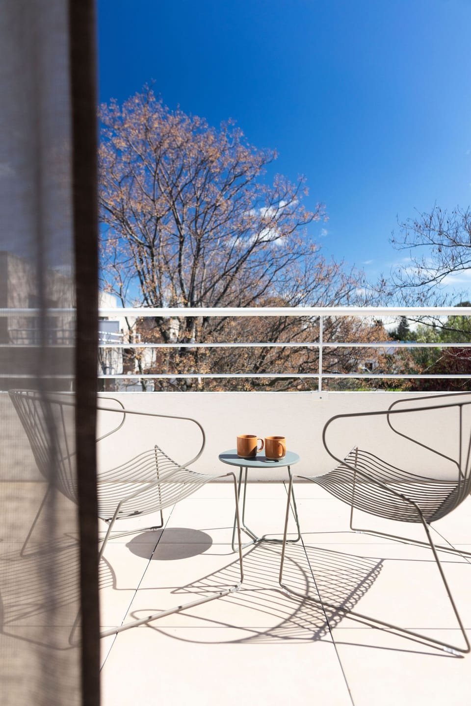 Private terrace with outdoor seating, ideal for shared meals, morning coffees, or quiet evening moments.