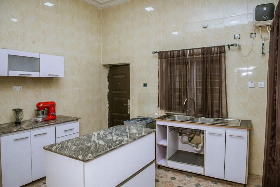 Economy Apartment, Balcony, City View | Private kitchen | Fridge, microwave, oven, stovetop