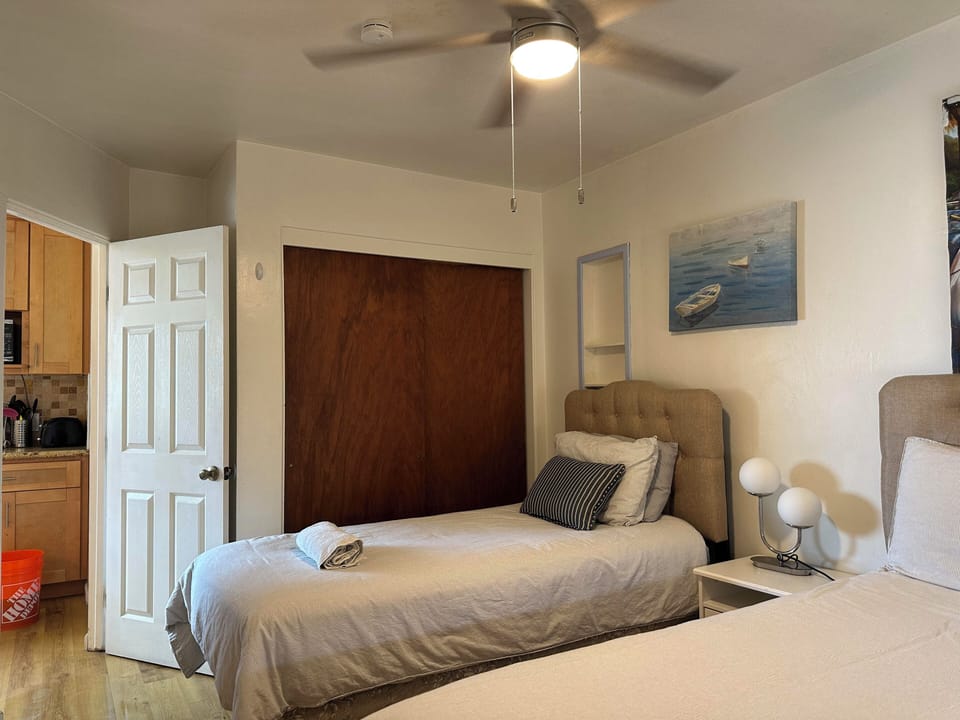 Bedroom is near kitchen.