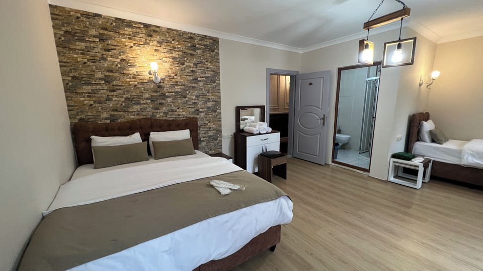 Deluxe Quadruple Room, Balcony, Mountain View | Desk, soundproofing, free WiFi