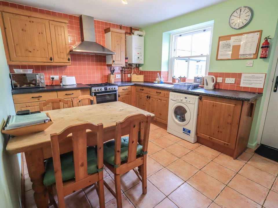 Fridge, microwave, toaster, cookware/dishes/utensils