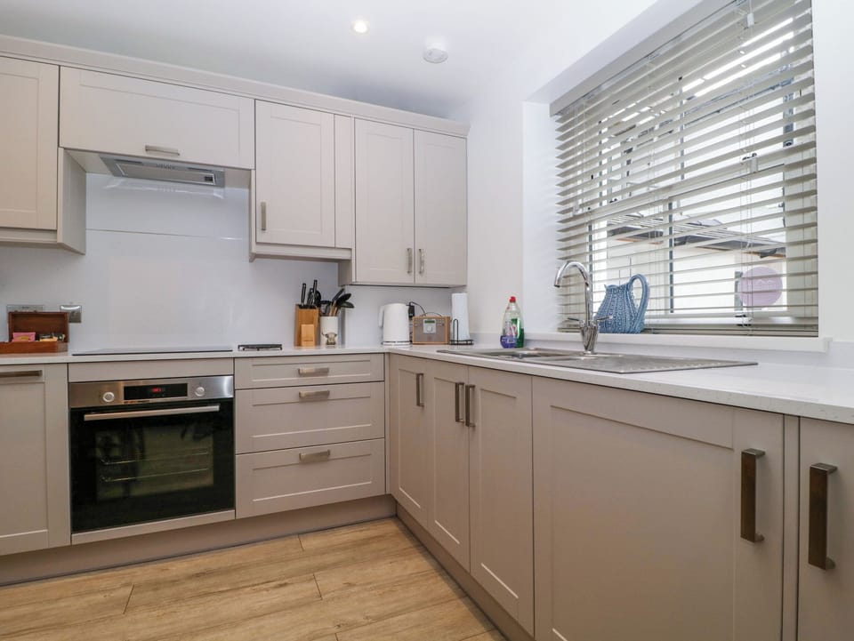 Fridge, microwave, toaster, cookware/dishes/utensils