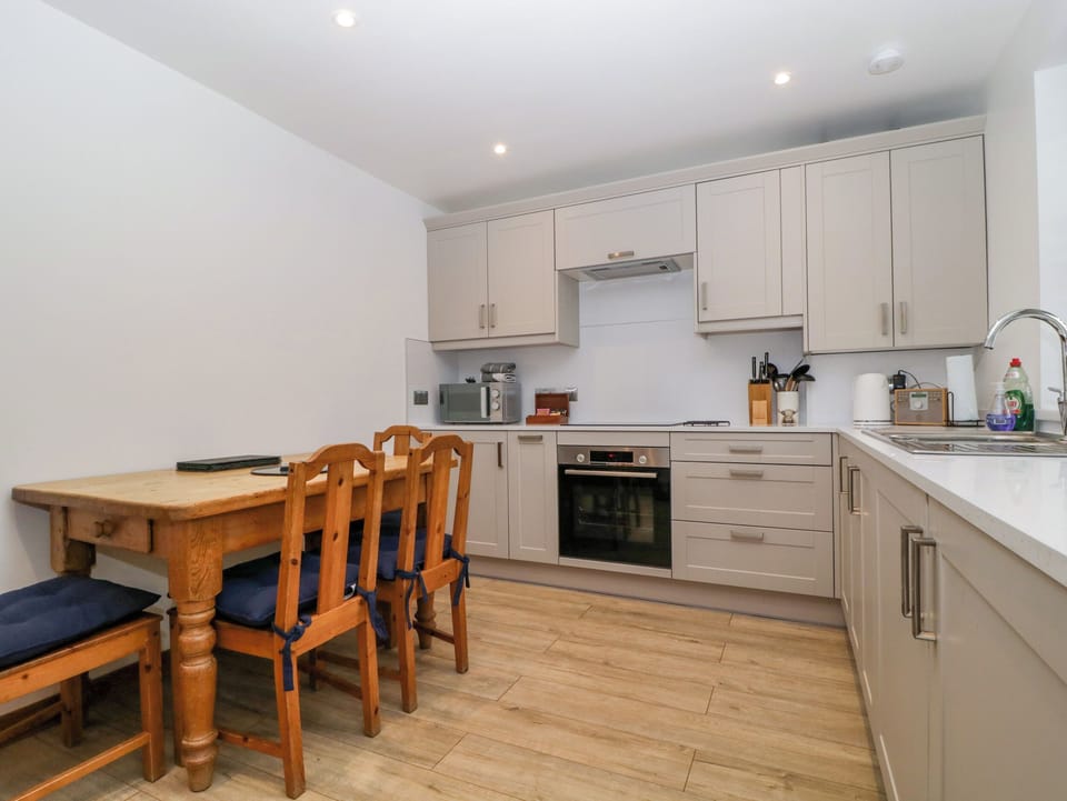 Fridge, microwave, toaster, cookware/dishes/utensils