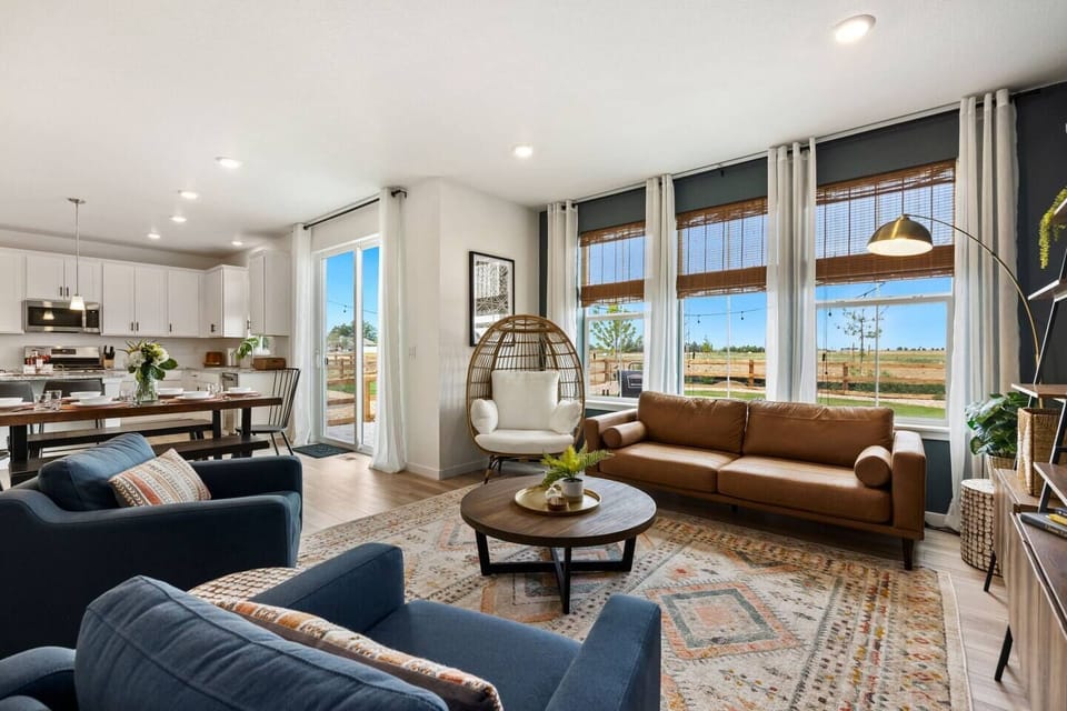 Unwind in this warm and welcoming space with comfortable seating, a large smart TV, and beautiful mountain views through the oversized windows. The egg chair is a guest favorite for curling up with a good book or relaxing after a day of exploring.