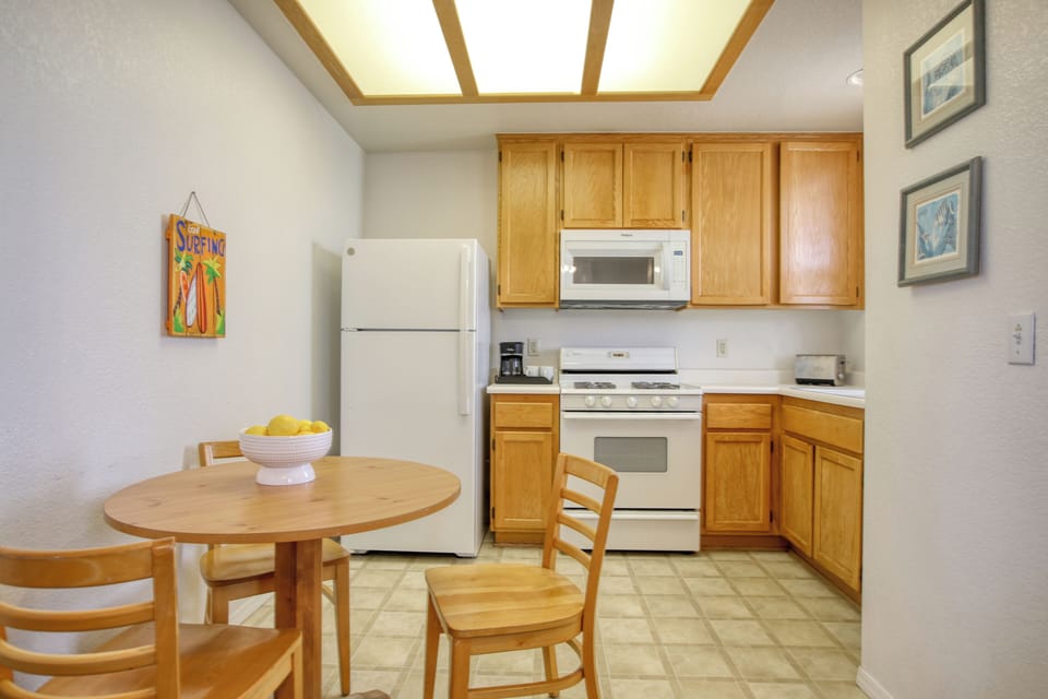 A cozy dining nook and ample storage for all of your kitchen needs!