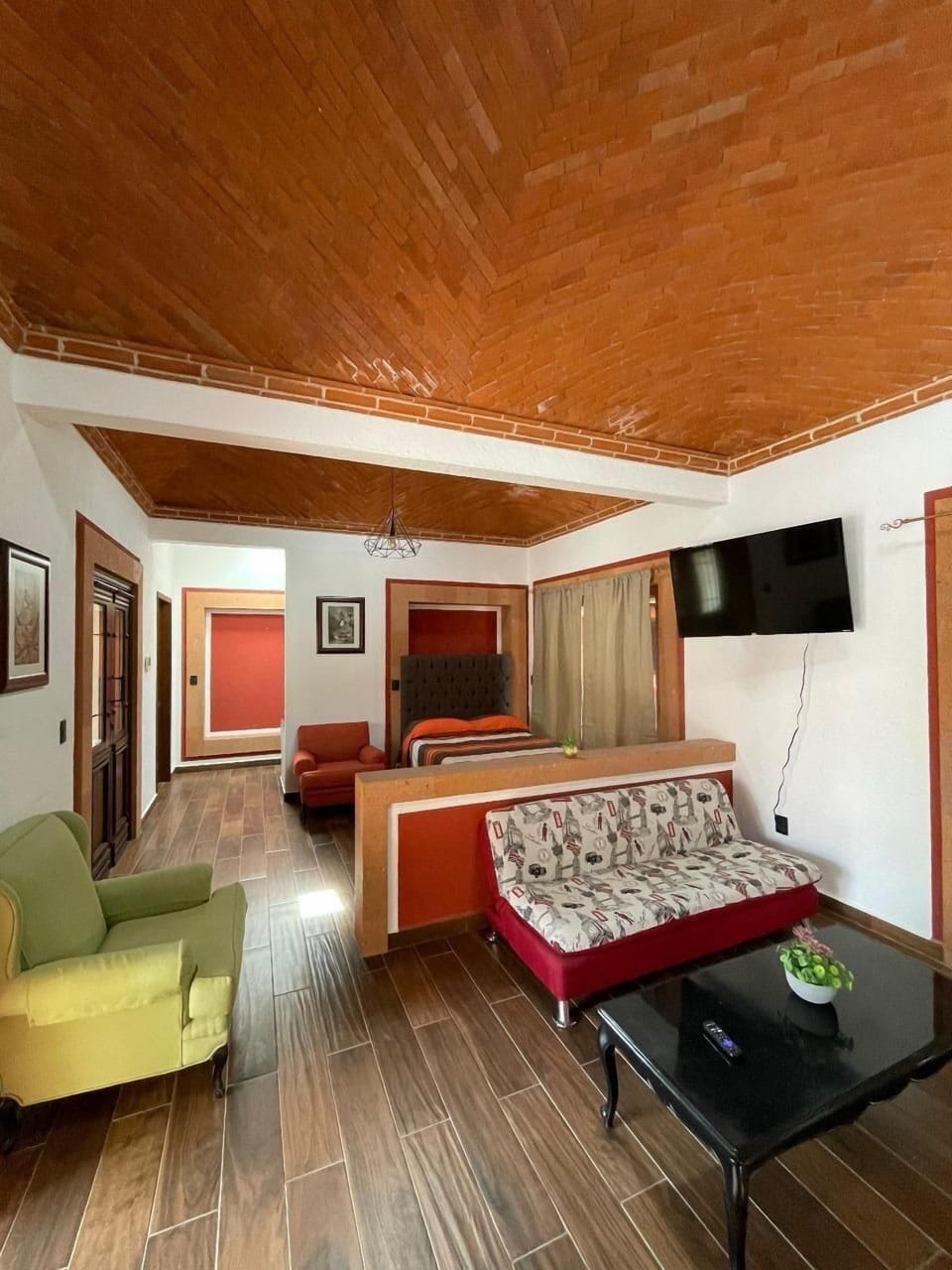 Family Triple Room | Living area | TV