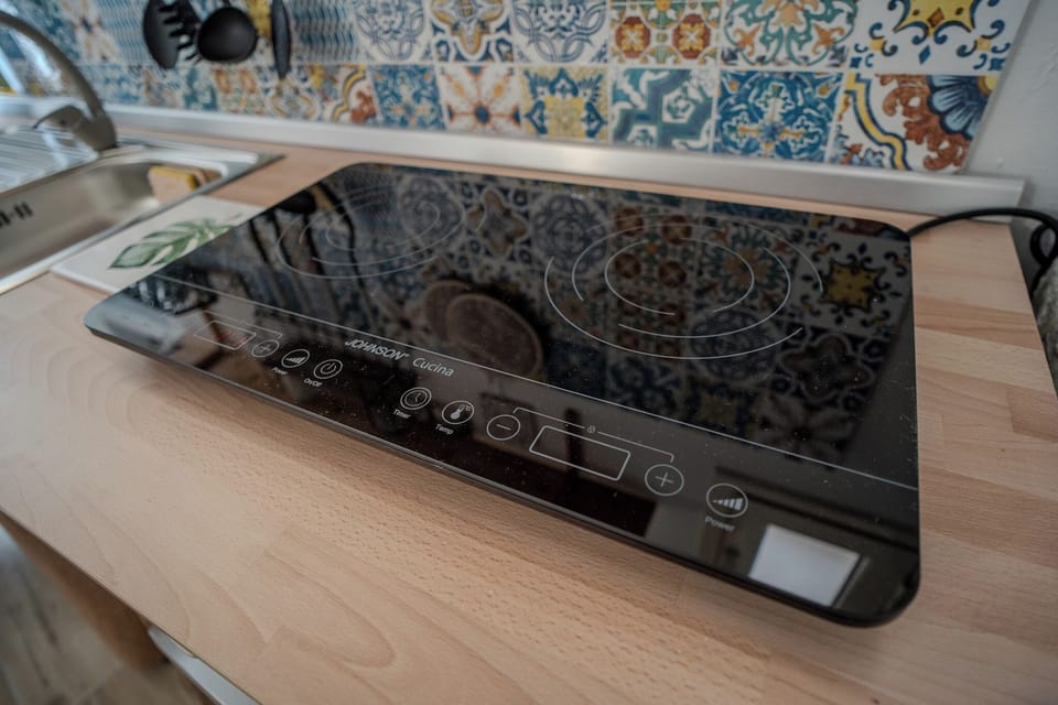 Apartment | Private kitchen | Fridge, microwave, stovetop, coffee/tea maker