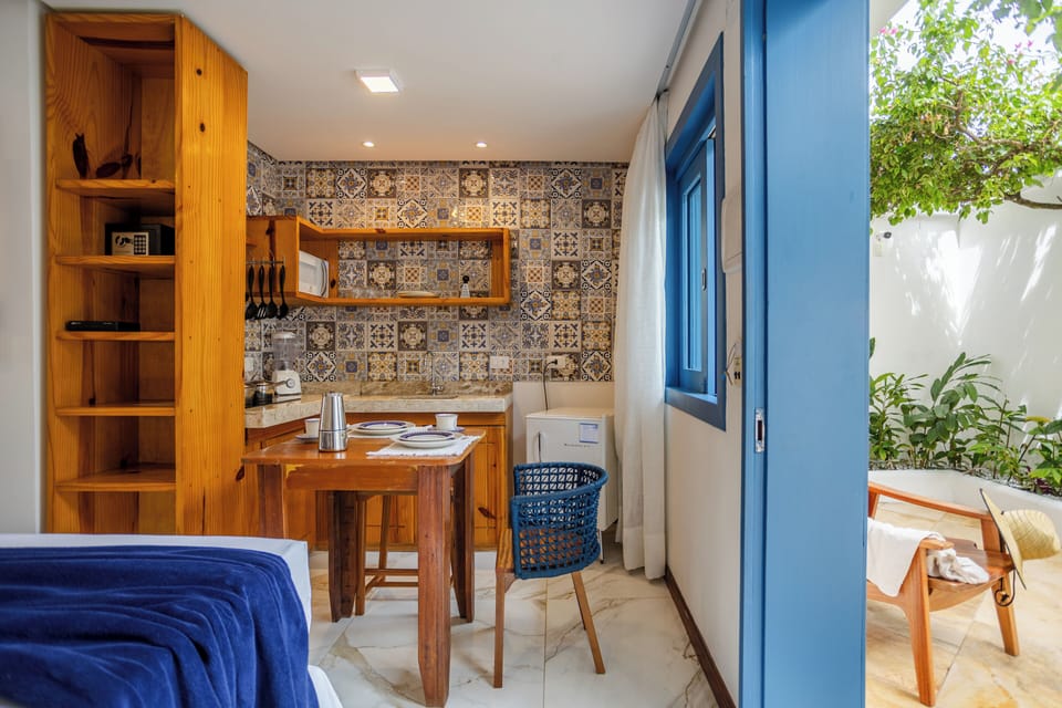 Standard Quadruple Room, Multiple Beds, Kitchen | In-room safe, blackout drapes, WiFi (free)