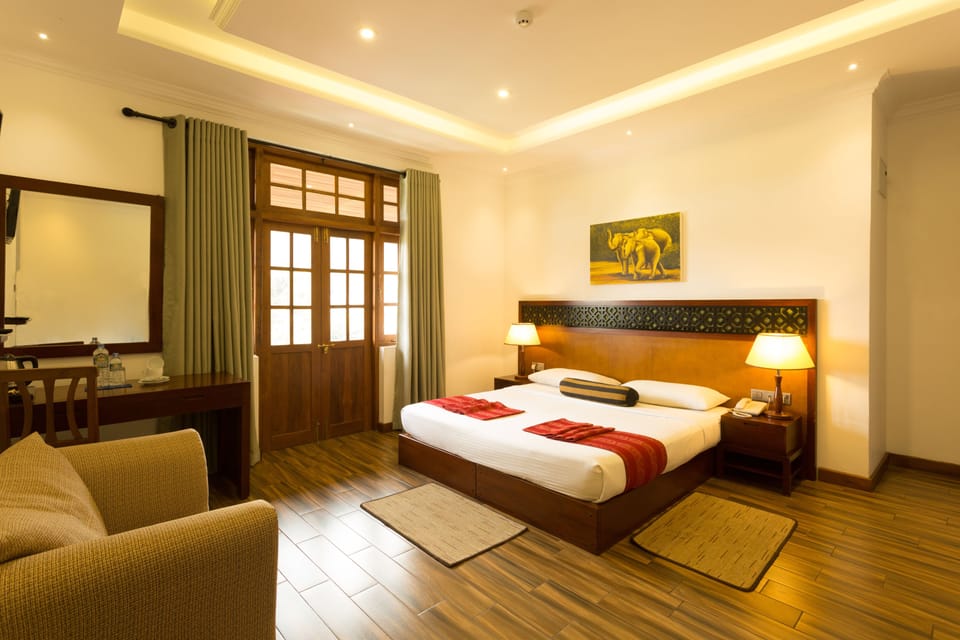 Deluxe Double Room, 1 Bedroom, Balcony | Premium bedding, desk, blackout drapes, iron/ironing board